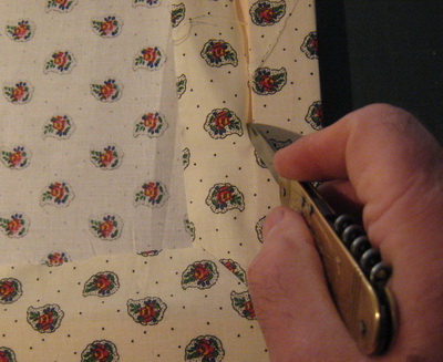 Cut the excess fabric on the back of the frame
