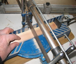 cutting elements with picture framer saw